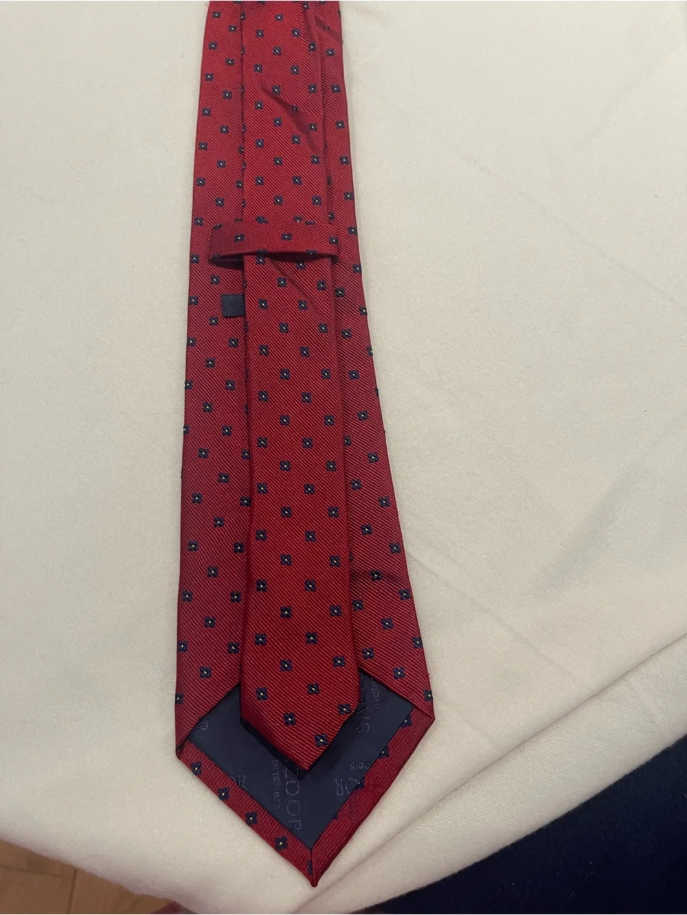 Classic Men's Red Tie with Navy Dot Accent